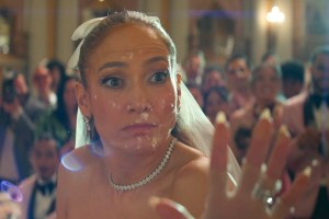 Jennifer Lopez gets a face full of cake in the This Is Me Now end credits scene
